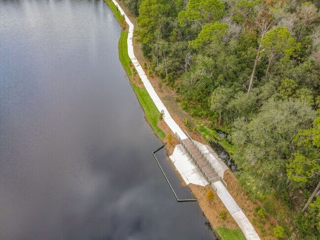 Building Photo - New Luxury Townhome in Celebration, FL Corner unit. All porcelain tiled floors. Aleutian model by...