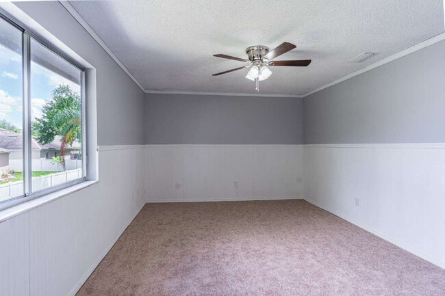 Building Photo - Minutes from UCF | Updated 4BR/3BA Home with Private Fenced Backyard
