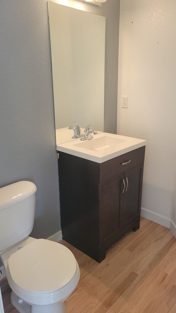 Building Photo - Beautiful Single Story Townhouse with Den & Attached 2-Car Garage