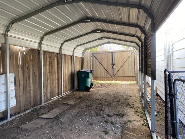 Carport behind gate - 2833 NW 15th st