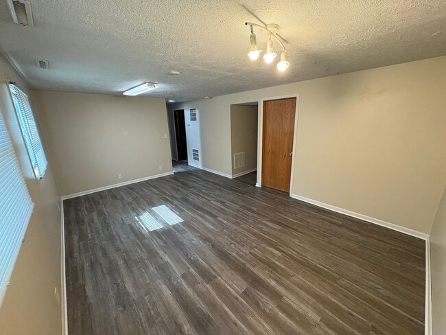 Building Photo - Spacious Single-Family Home with Fenced Backyard & Attached Garage