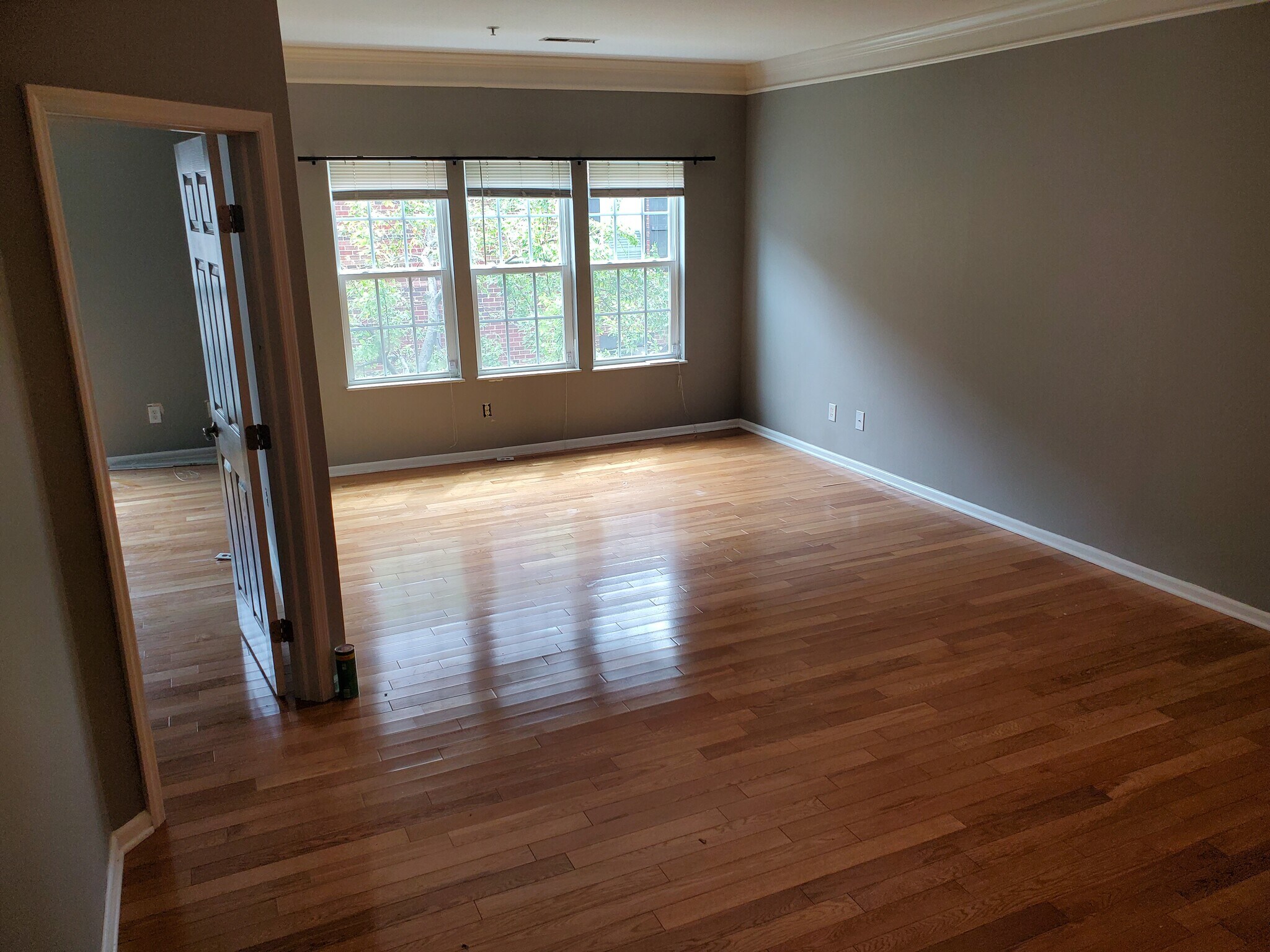 Main room with REAL hickory Harwood floors. ( NOT LVP. The real deal) - 6126 Inishmore Ln