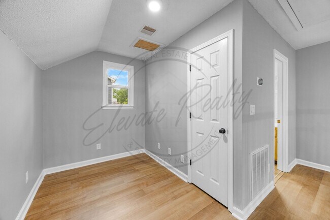Building Photo - Four Bedroom Two Story with Two Car Garage...