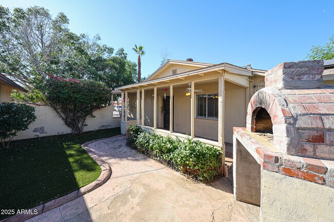 Building Photo - 3408 W Port Au Prince Ln