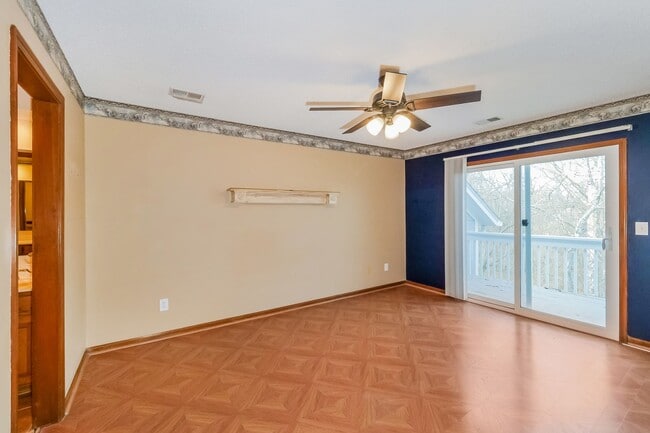 Building Photo - 4 Bedroom Shawnee Townhome with Finished Basement and Wooded Views