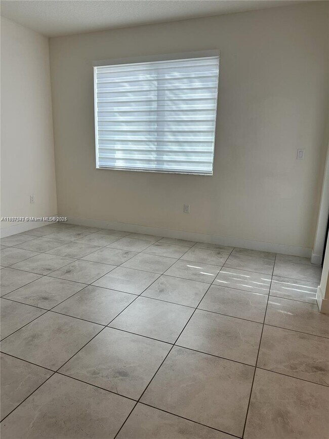 Building Photo - 4670 NW 84th Ave