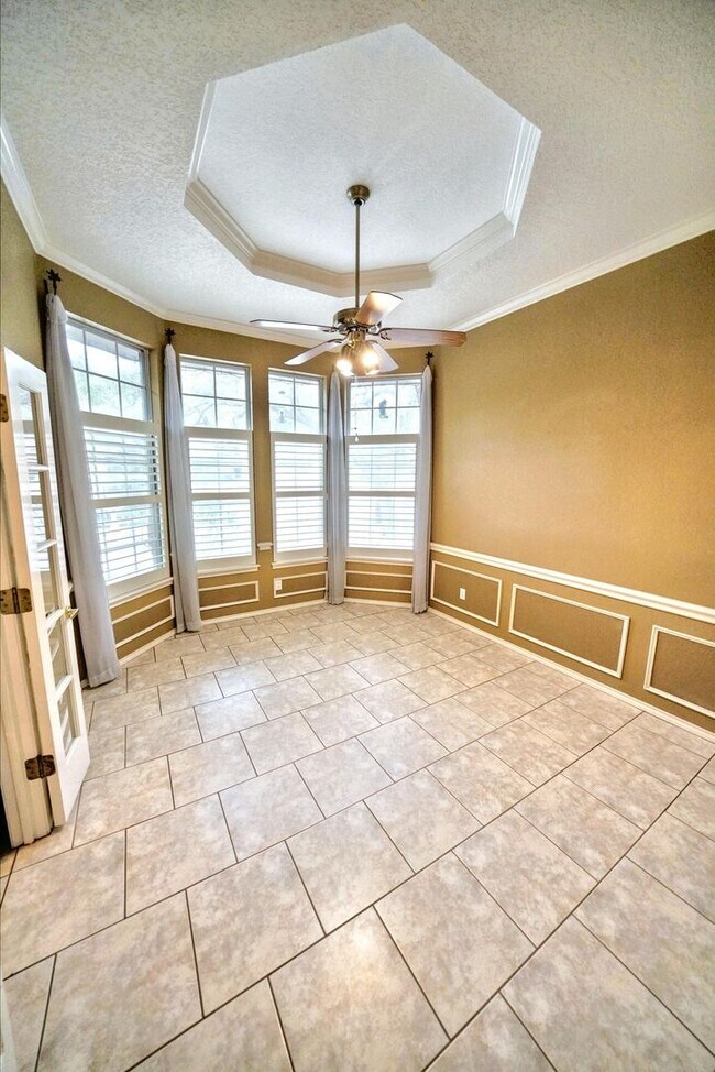 Building Photo - Executive Home in Greenshire with Luxurious Updates and Spacious Outdoor Living - Agent Commissio...