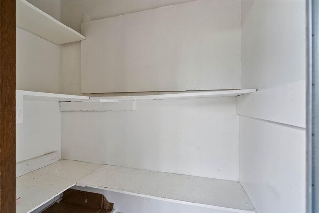 Building Photo - $500 off! Spacious 1-bdrm/1-bath condo in quiet neighborhood. Balcony, 2 parking spaces, fireplac...