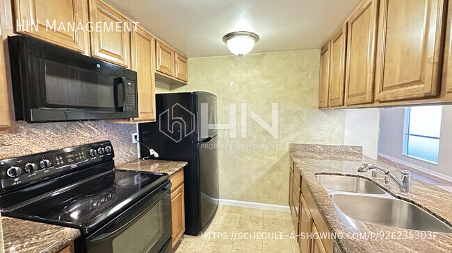 Building Photo - 5572 Magnolia Terrace