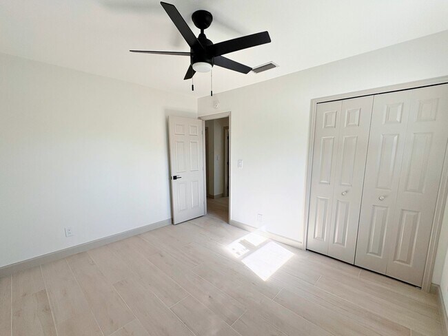 Building Photo - Fully Renovated 2BR Home with Designer Finishes & Fenced Yard