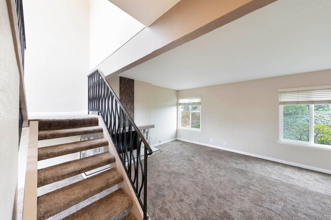 Building Photo - Fully renovated 2 bedroom 2 car garage Townhome