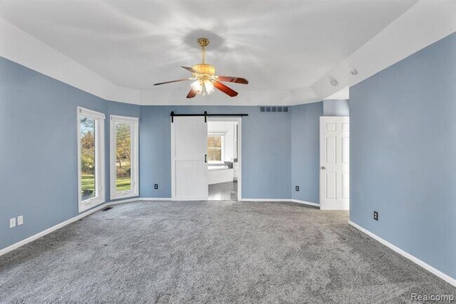 Building Photo - 6573 Poppleton Rd