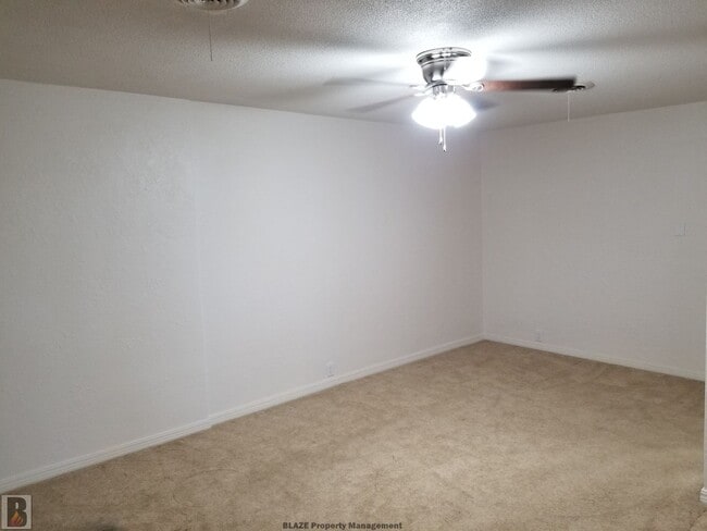 Building Photo - Massive Corner-Lot Home with Retro Charm & Shady Backyard!