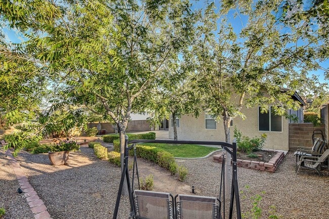 Building Photo - Gorgeous NW Single Story! 3 Car Garage! Serene Backyard.