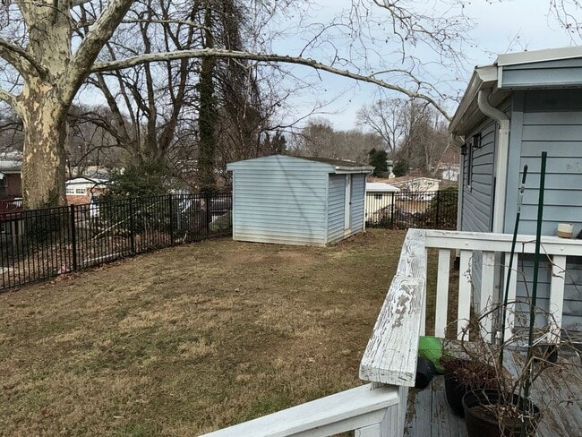 Building Photo - Fully updated 4BR 3BA single family rambler in Twinbrook Forest