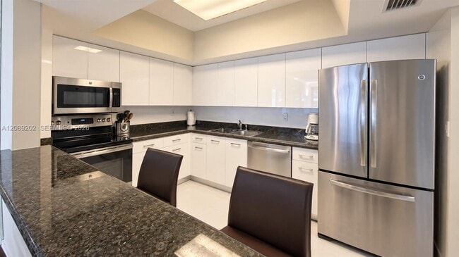 Building Photo - 9455 Collins Ave