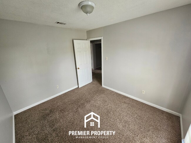 Building Photo - Quiet Cove Living in 38115 | 3BR/2BA with Brick Fireplace & Fenced Yard