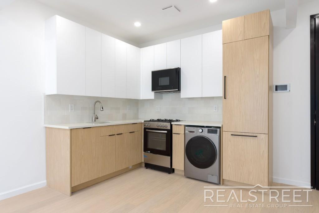 Building Photo - Spacious 2-Bedroom, 2-Bath Apartment in Bed-Stuy with Modern Amenities