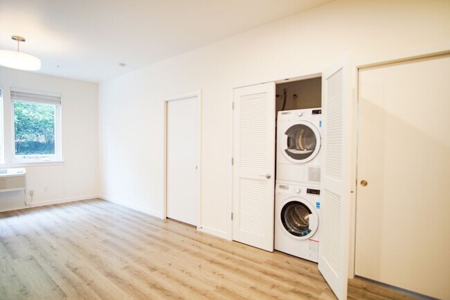 Building Photo - John's Landing: Modern + Spacious 2Bdr Ready Soon!