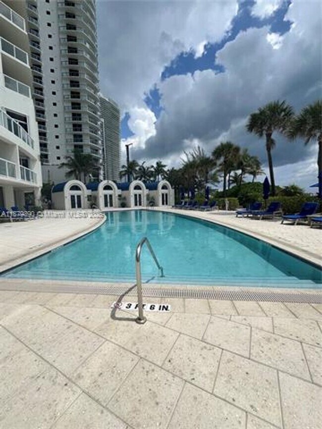 Building Photo - 18671 Collins Ave