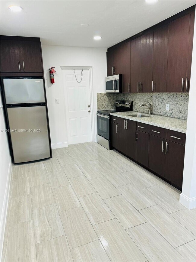 Building Photo - 631 NW 11th Ave