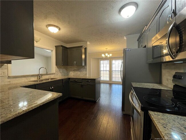 Building Photo - 7128 Calamar Dr
