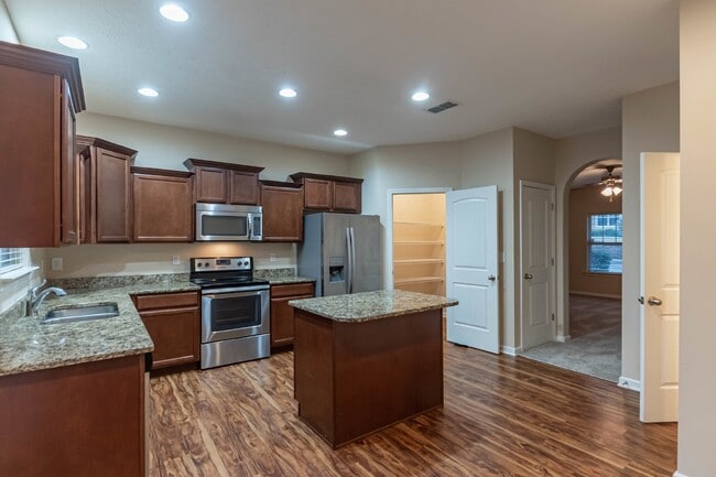 Building Photo - Available Now! Wonderfull Location! 2/2.5 Townhome w/ Upgrades.