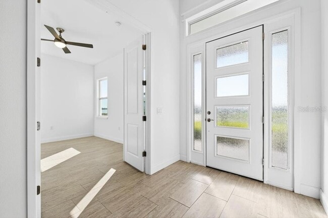 Building Photo - 200 Snowy Orchid Way