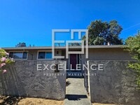 Building Photo - Fabulous 2/2 Duplex with Garage,Cat OK, Patio, Granite Counters and Fireplace