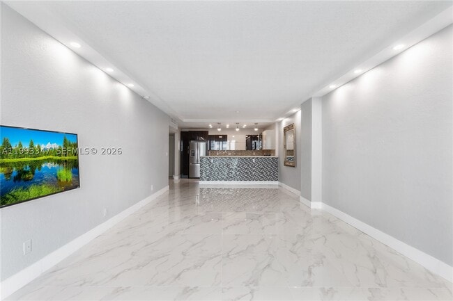 Building Photo - 19380 Collins Ave