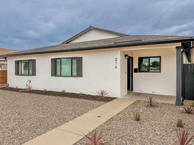 Building Photo - Modern 3-Bedroom Home with Private Yard in...