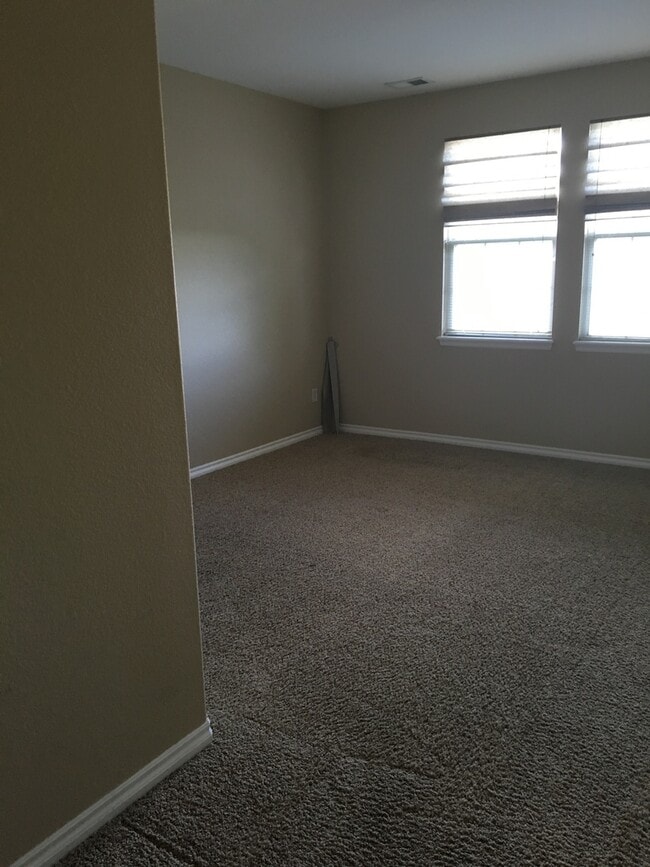 Building Photo - Beautiful + Bright Broadlands Condo for Lease!