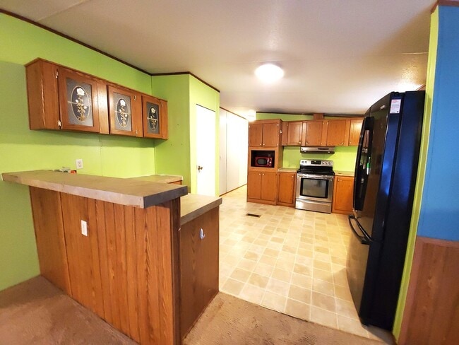 Building Photo - Spacious 4 bedroom with 3 FULL bathrooms nestled on 2 acres! MUST SEE!!!