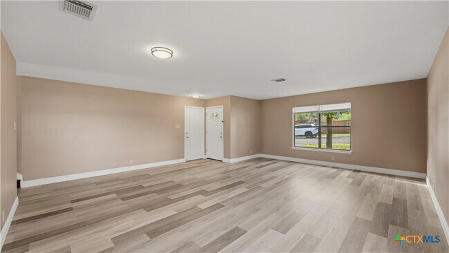 Building Photo - 7338 Raintree Forest