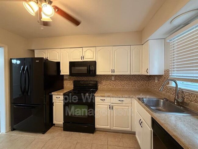 Building Photo - 1045 N Florissant Rd