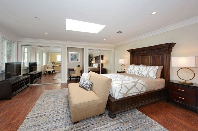 Building Photo - Welcome to this beautifully updated Spanis...