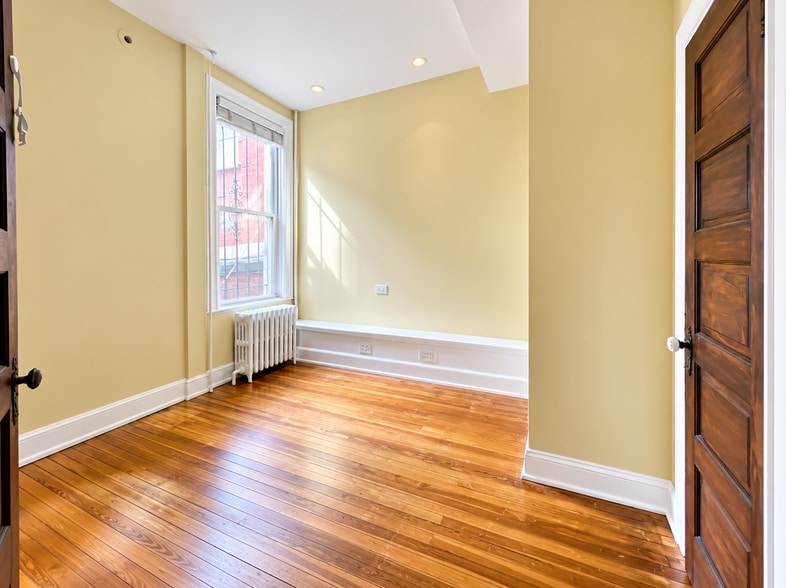 2nd floor bedroom with closet and hardwood floors - 2322 1st St NW