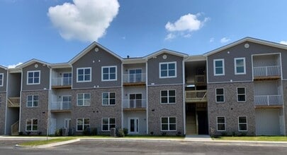 Building Photo - The Villages at Lake Reba