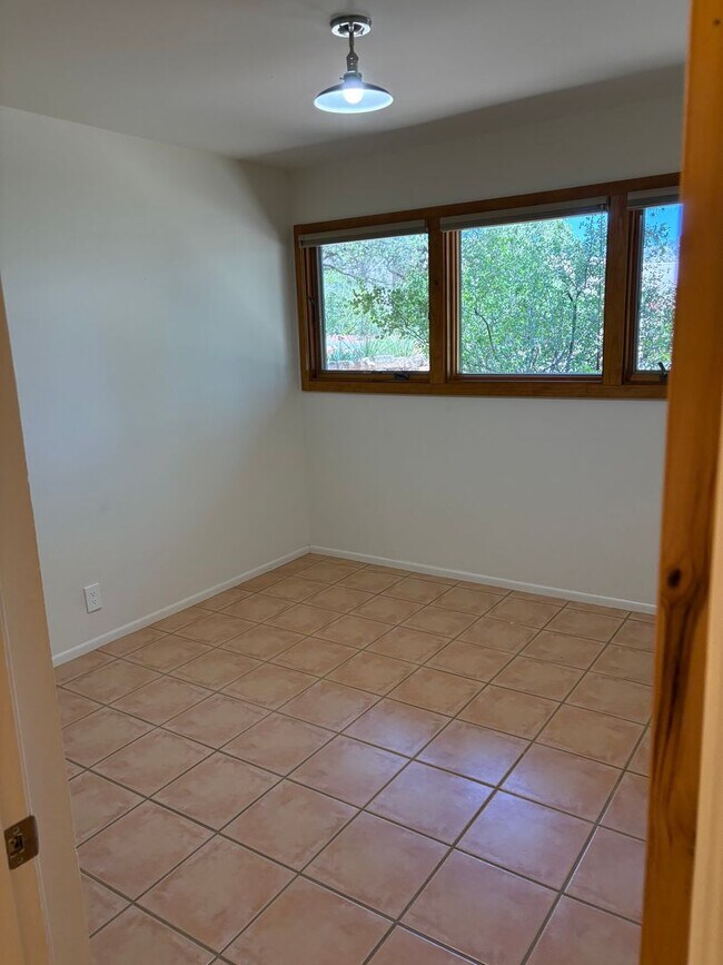 Building Photo - Unfurnished, 6 month minimum rental
