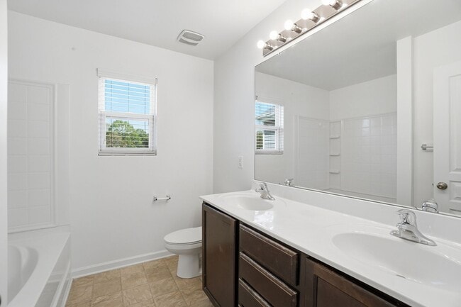 Building Photo - 4-bedroom with Water Front View