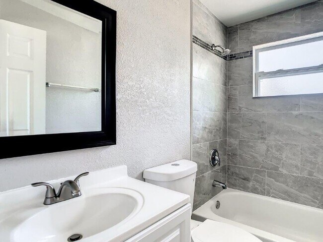 Building Photo - Completely upgraded 3/1 1196 Sq. Ft. with recently renovated bathroom and kitchen with GRANITE& a...