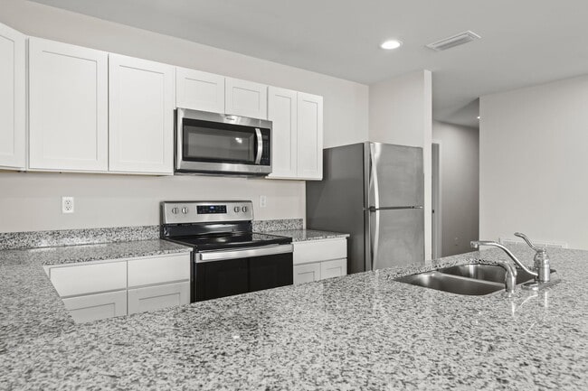 Building Photo - Beautiful 4/2 home with NEW fenced yard