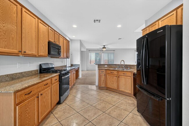 Building Photo - CORNER LOT 4-BEDROOM HOME + LOFT  WITH 3.5 BATHS AND 3-CAR GARAGE!