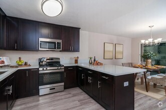 Building Photo - 4 Bedrooms and 2.5 baths!  Modern upgrades...