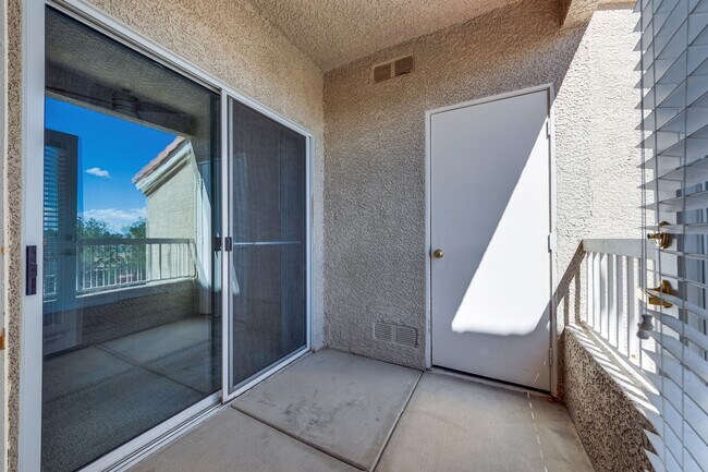 Building Photo - Move-In Ready Condo with Private Balcony & Modern Upgrades