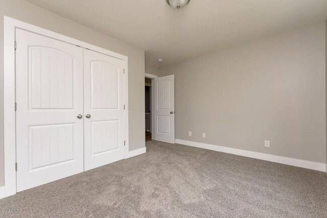 Building Photo - Spacious 3BR Duplex with Finished Basement & 2-Car Garage in Otsego