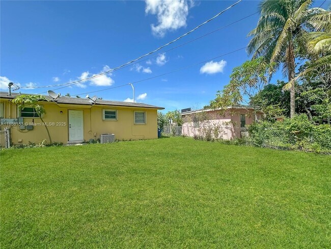 Building Photo - 1050 NW 103rd St
