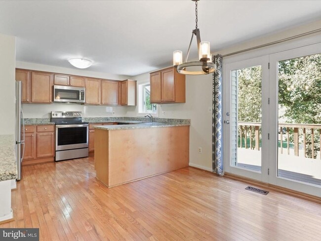 Building Photo - 6502 Coachleigh Way