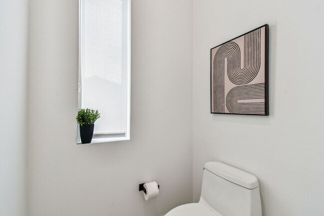 Building Photo - A charming coastal townhouse, just minutes from downtown St. Pete!