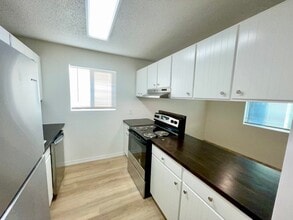 Building Photo - RENOVATED 2BD/1BA MILLWOOD APARTMENT | A/C | COVERED PARKING | PET FRIENDLY | AVAIL APRIL 15, 2026